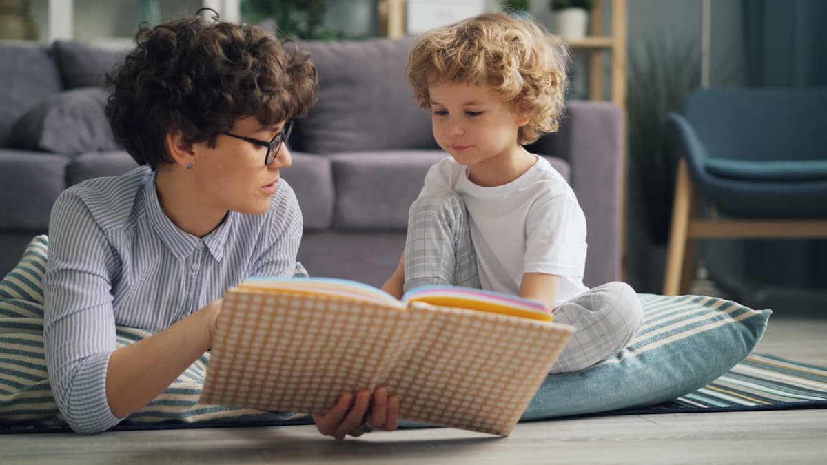 A parent and child reading together